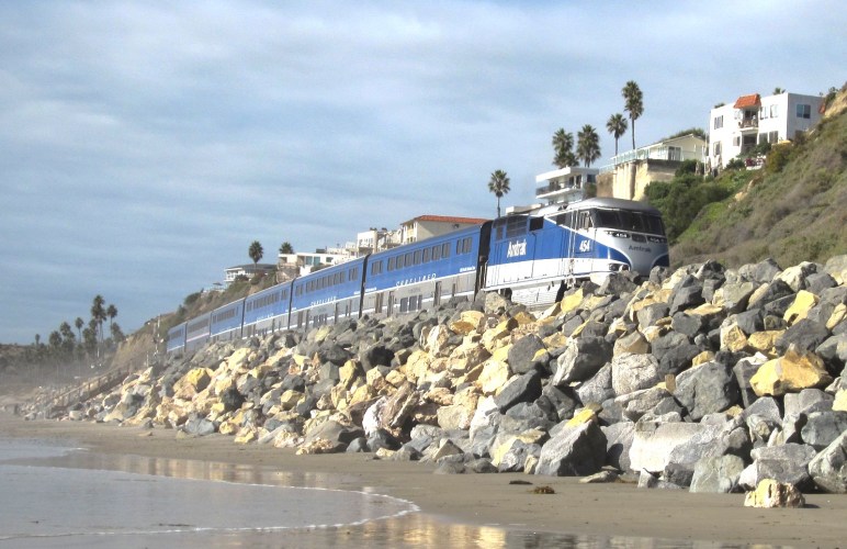 Pacific Surfliner next to a beach in San Clemente