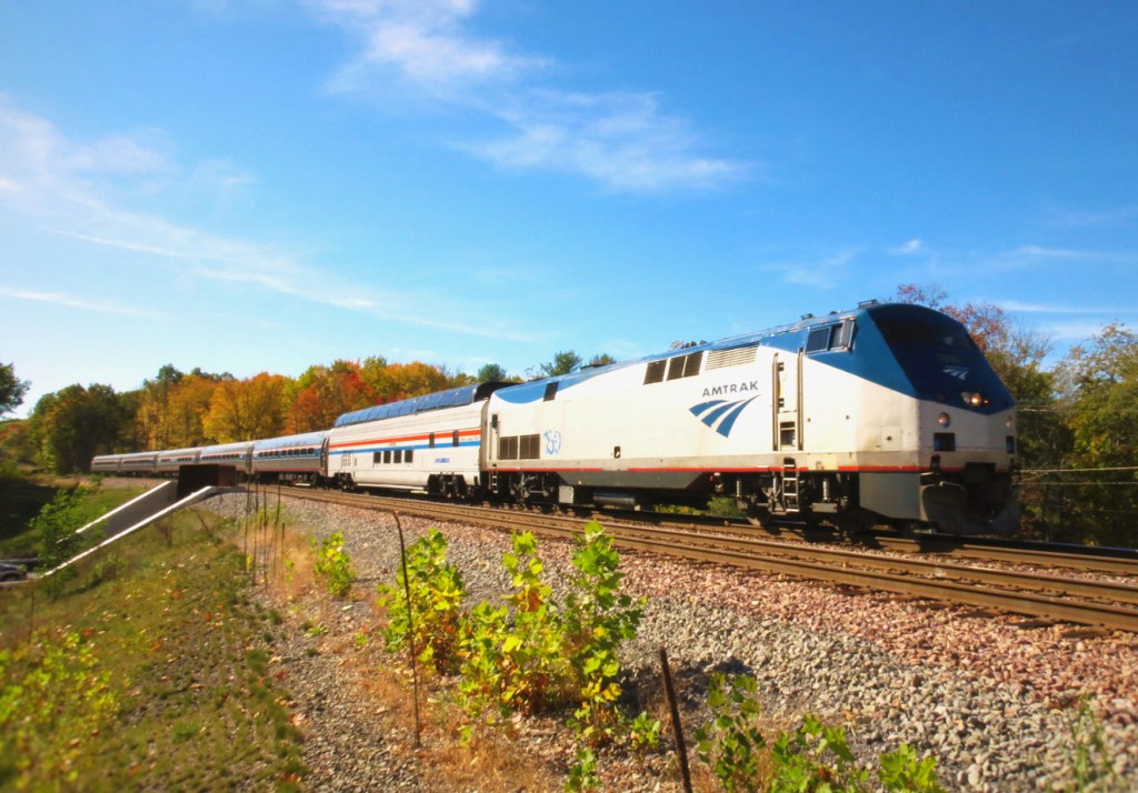 Adirondack train in Upstate New York with fall foliage